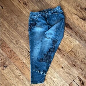 Embroidered jeans fancied up with black stitching